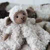

Chanel on cosy blanket and wooden ring
2